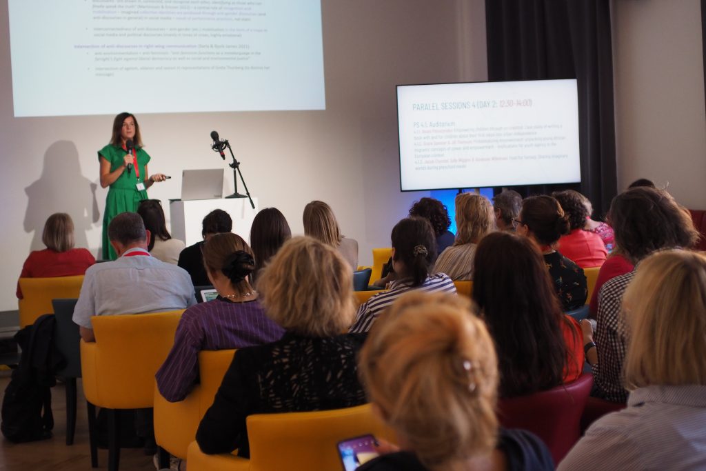 A woman speaking at the conference